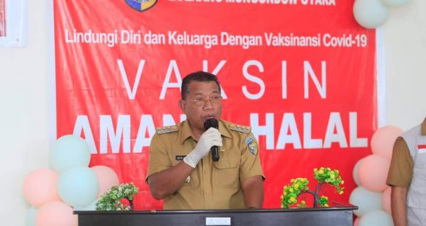 Bupati Bolmut, Drs. H. Depri Pontoh, saat membuka pencanangan Vaksinasi Covid-19
